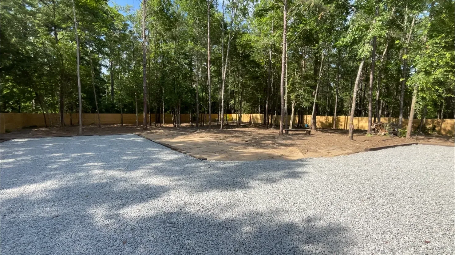 Before and after of a shop yard regraded